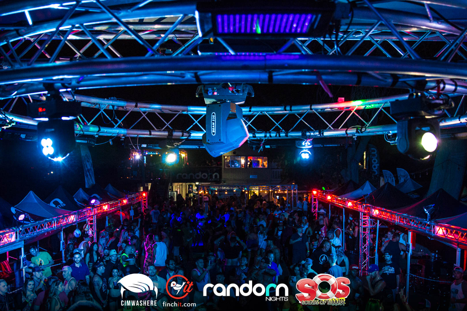 Night crowd under blue and red light