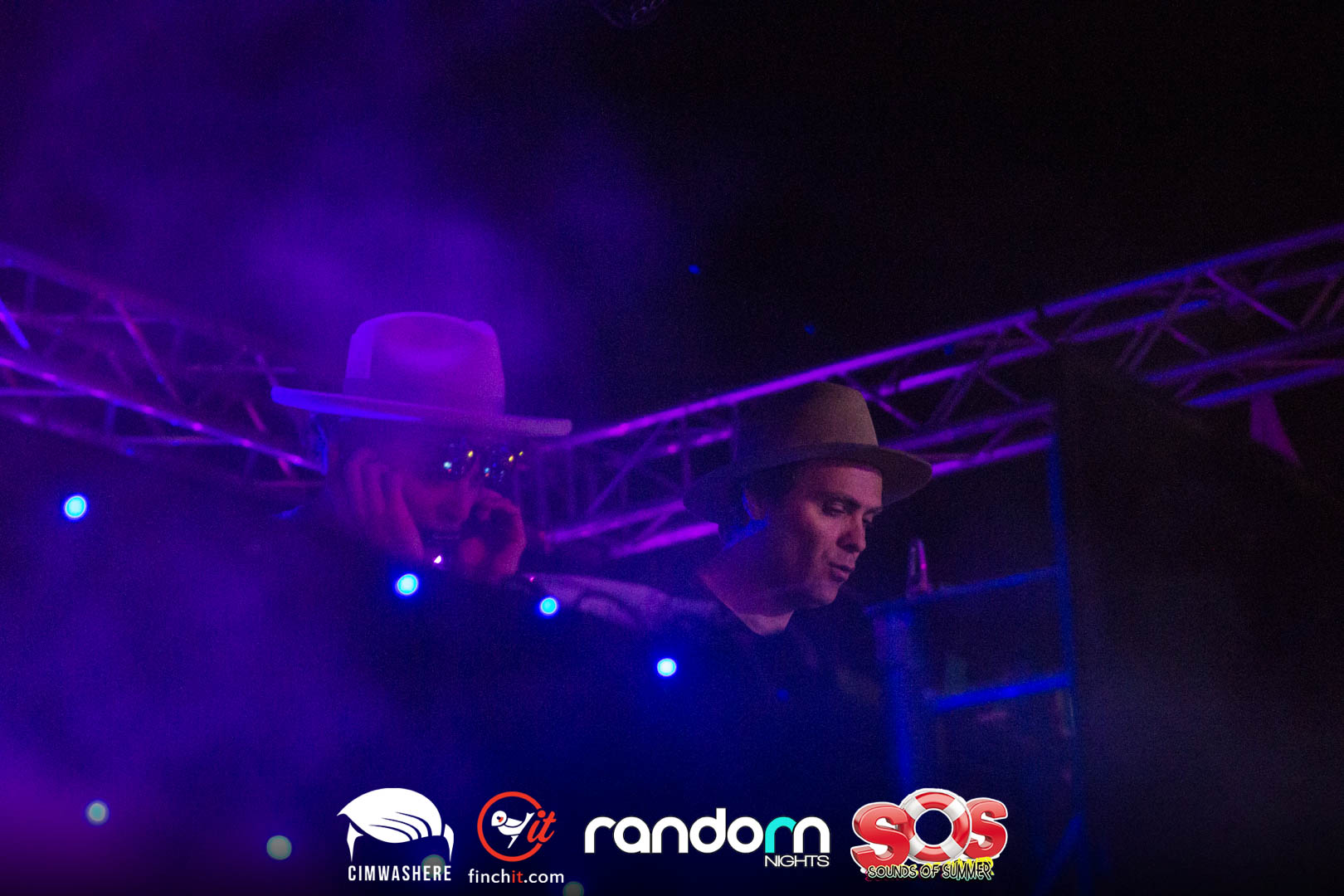 DJ silhouette in purple light