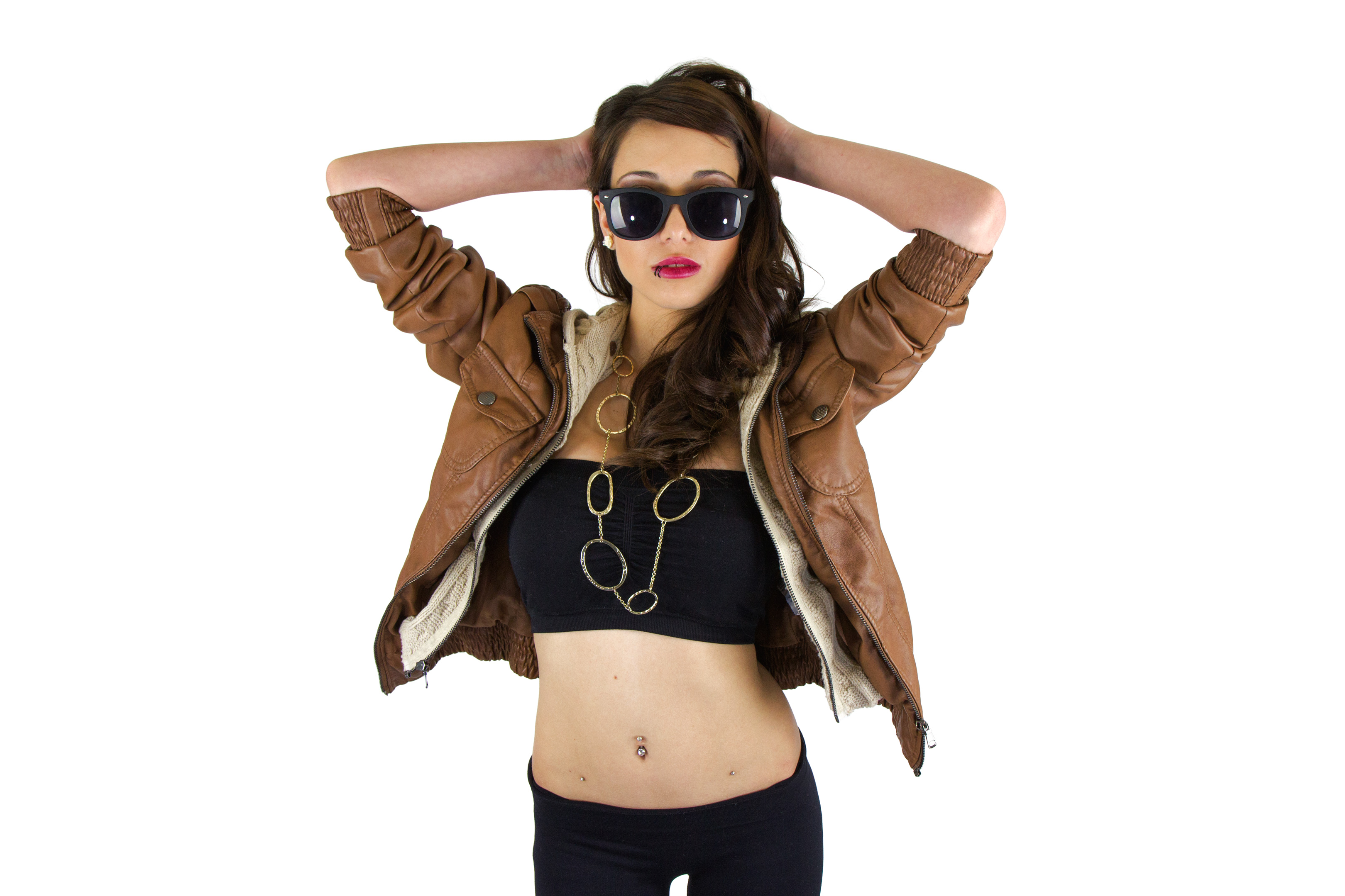 Studio portrait with sunglasses and layered styling