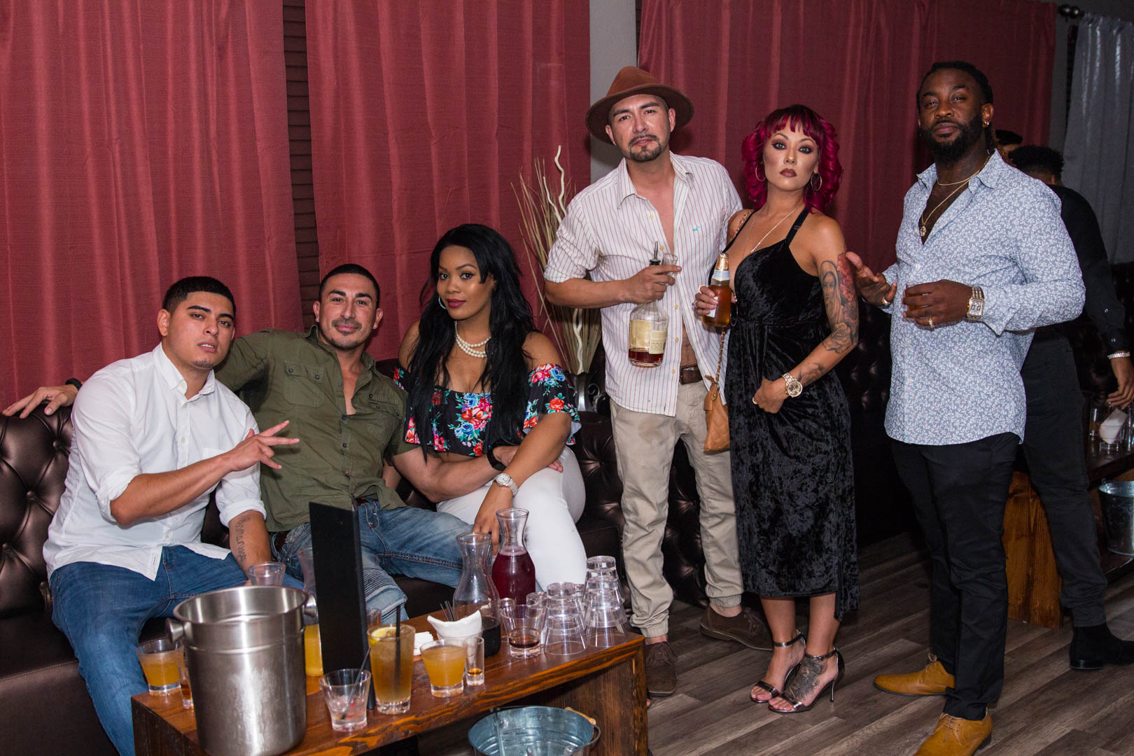 Group portrait in a lounge booth