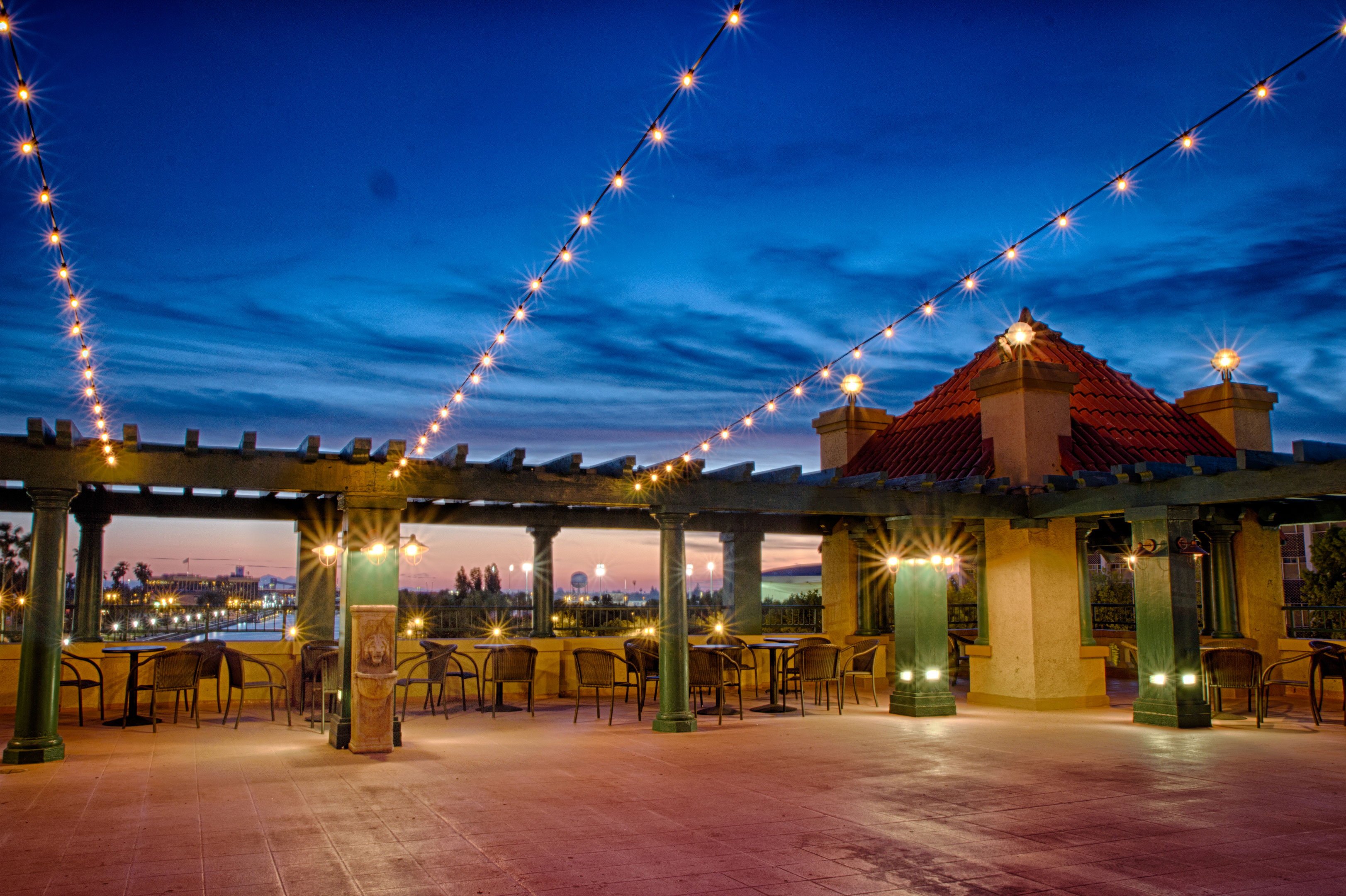 Rooftop at blue hour with string lights