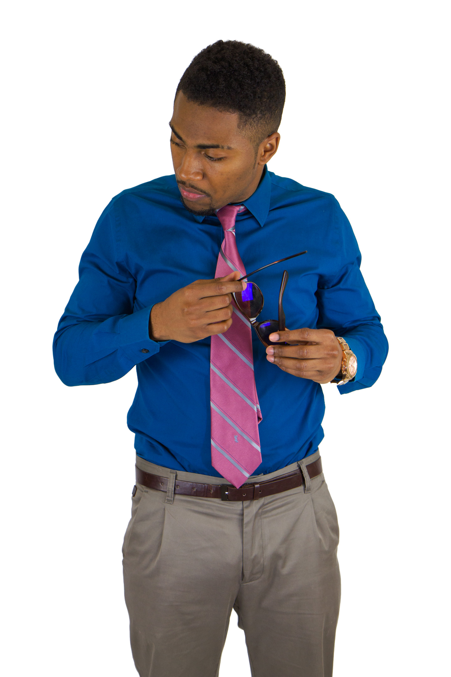 Studio portrait adjusting a tie