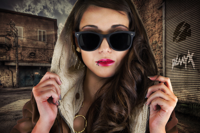Portrait with sunglasses and illustrated wall